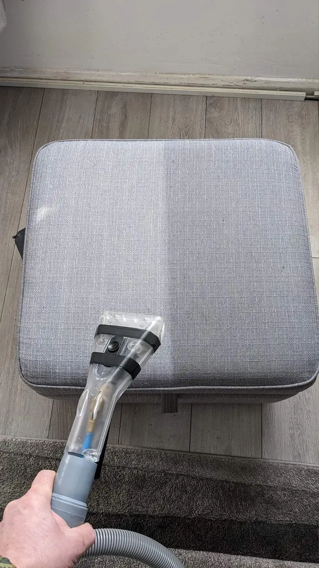 Footstool halfway through an upholstery clean
